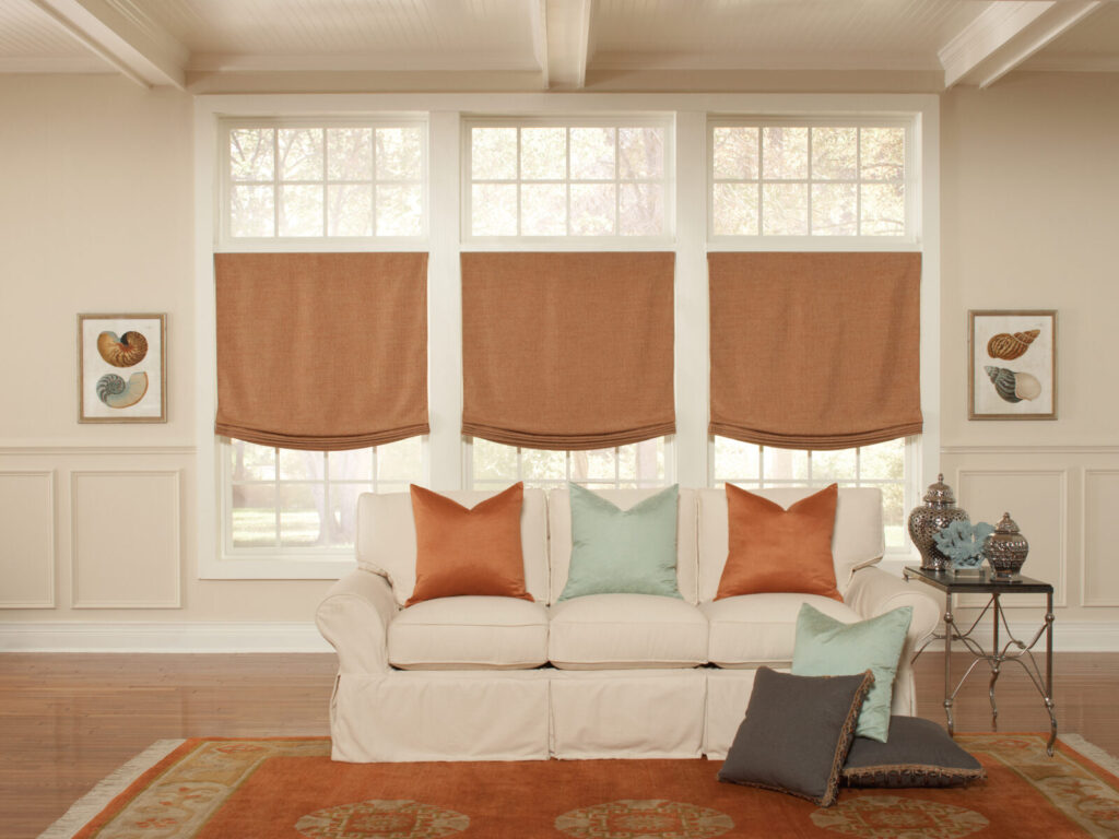 Cordless orange roman shades