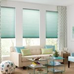Light blue celluar shades in a living room