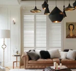 Plantation shutters in the living room of a residential home