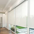 Residential home with motorized shades in the living room
