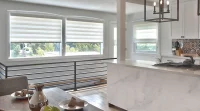 Transition shades by the kitchen in luxury home