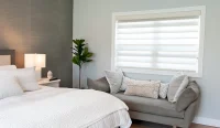Transition shades in luxury bedroom of home